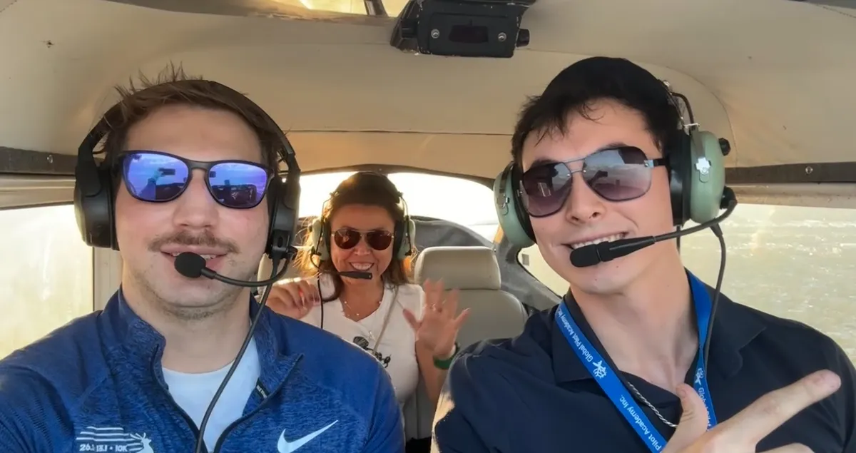Guilherme, Nicholas, and Carolina Chamberlin flying together in the cockpit